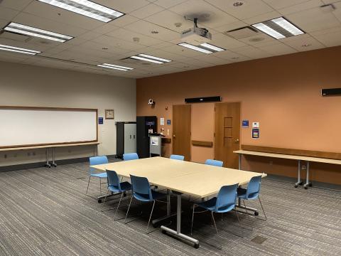 Table and chairs set up in Trillium Meeting Room